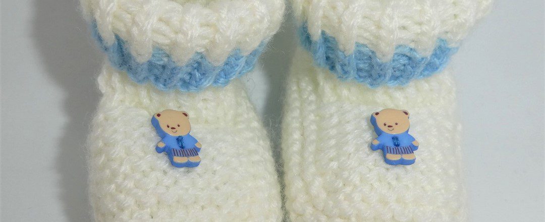 Babyschuhe mit Teddybär