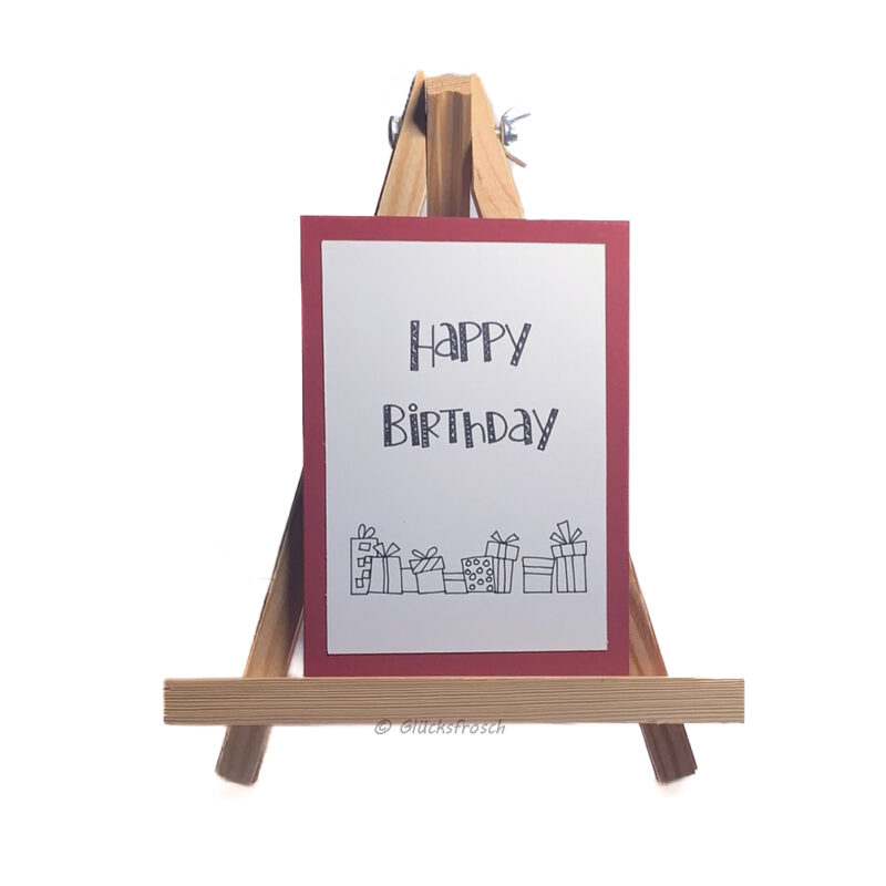 Geburtstagskarte "Happy Birthday" weinrot mit vielen kleinen Päckchen, weißer Aufleger