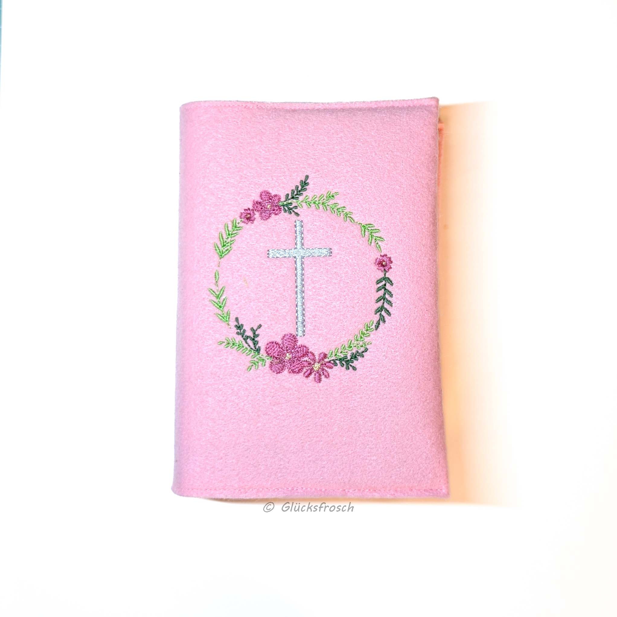 Gotteslobhülle, Filz, rosa, mit Blütenkranz und silbergrauem Kreuz bestickt