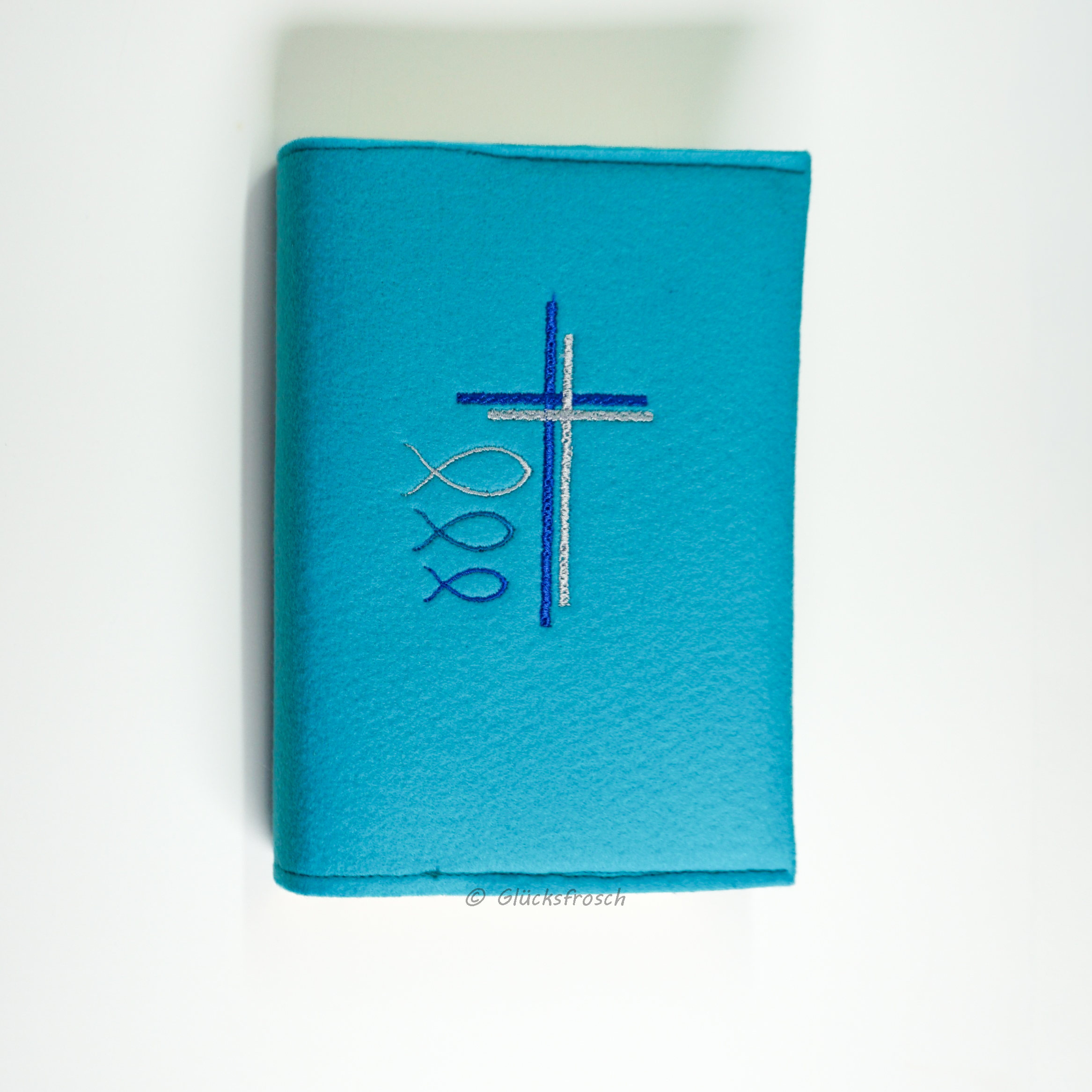 Gotteslobhülle, Filz, türkis, bestickt mit zwei Kreuzen und drei Fischen – Bild 2